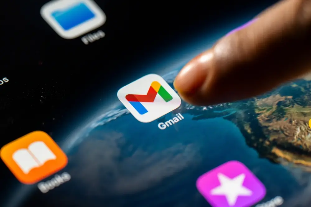 User opening the Gmail app on an iPhone following reports of leaked login credentials